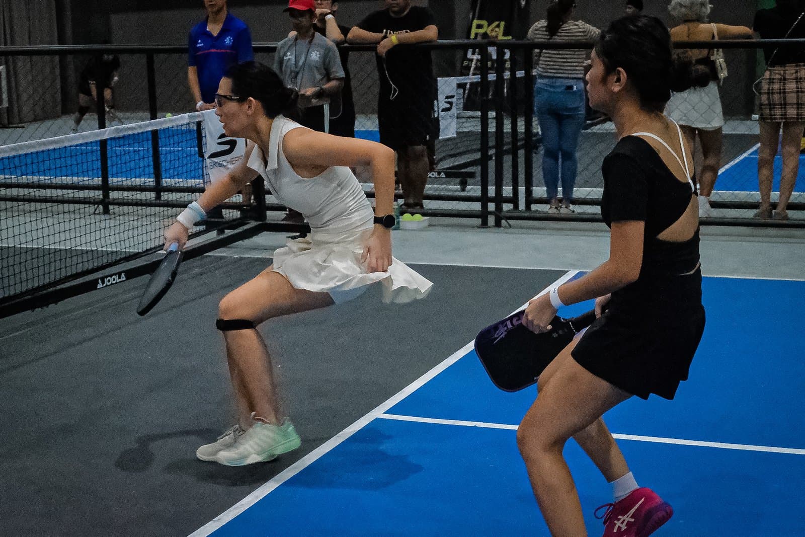 Competitive pickleball action at Tela Park
